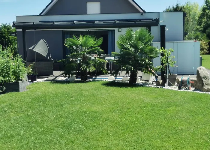 Photo de Appartement 5* Palmenoase Am Pool Im Elsass à Blodelsheim